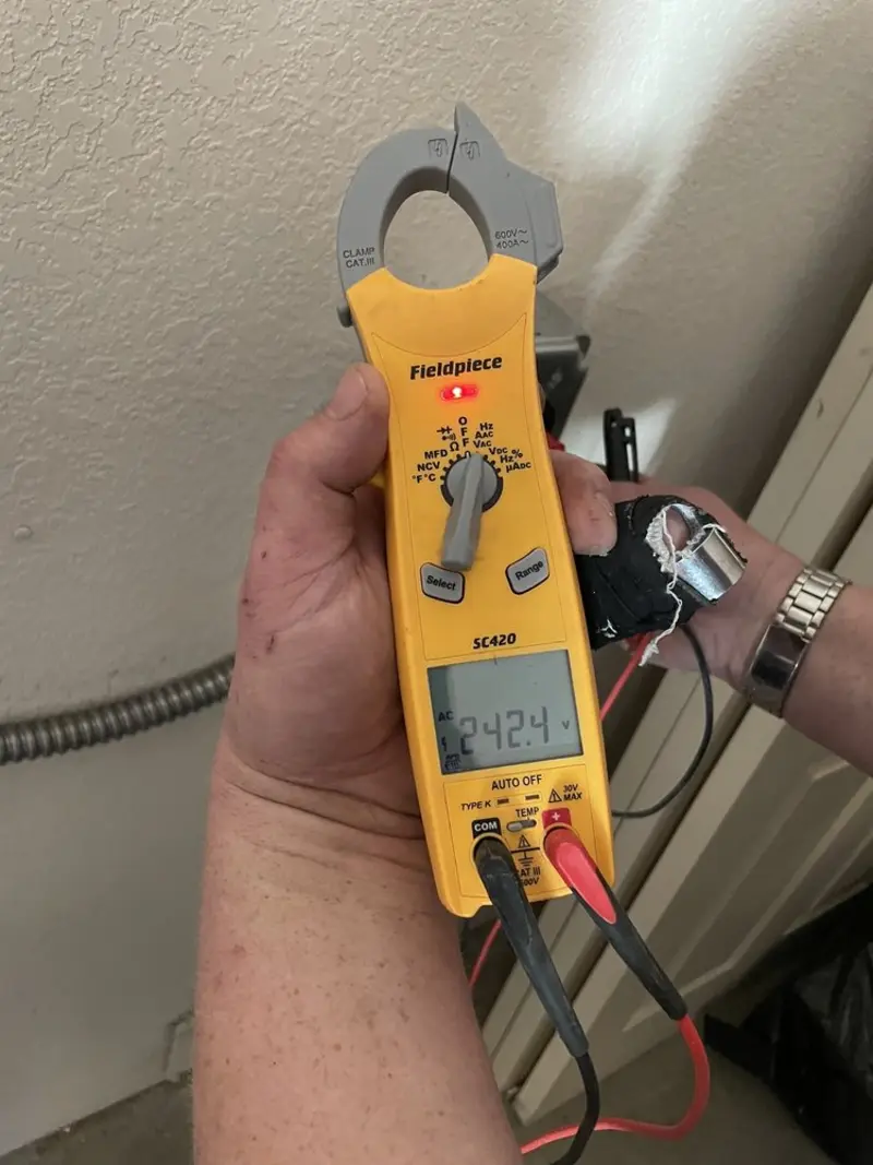Voltage testing with clamp meter during Generator Installation in Ridge Wood Heights